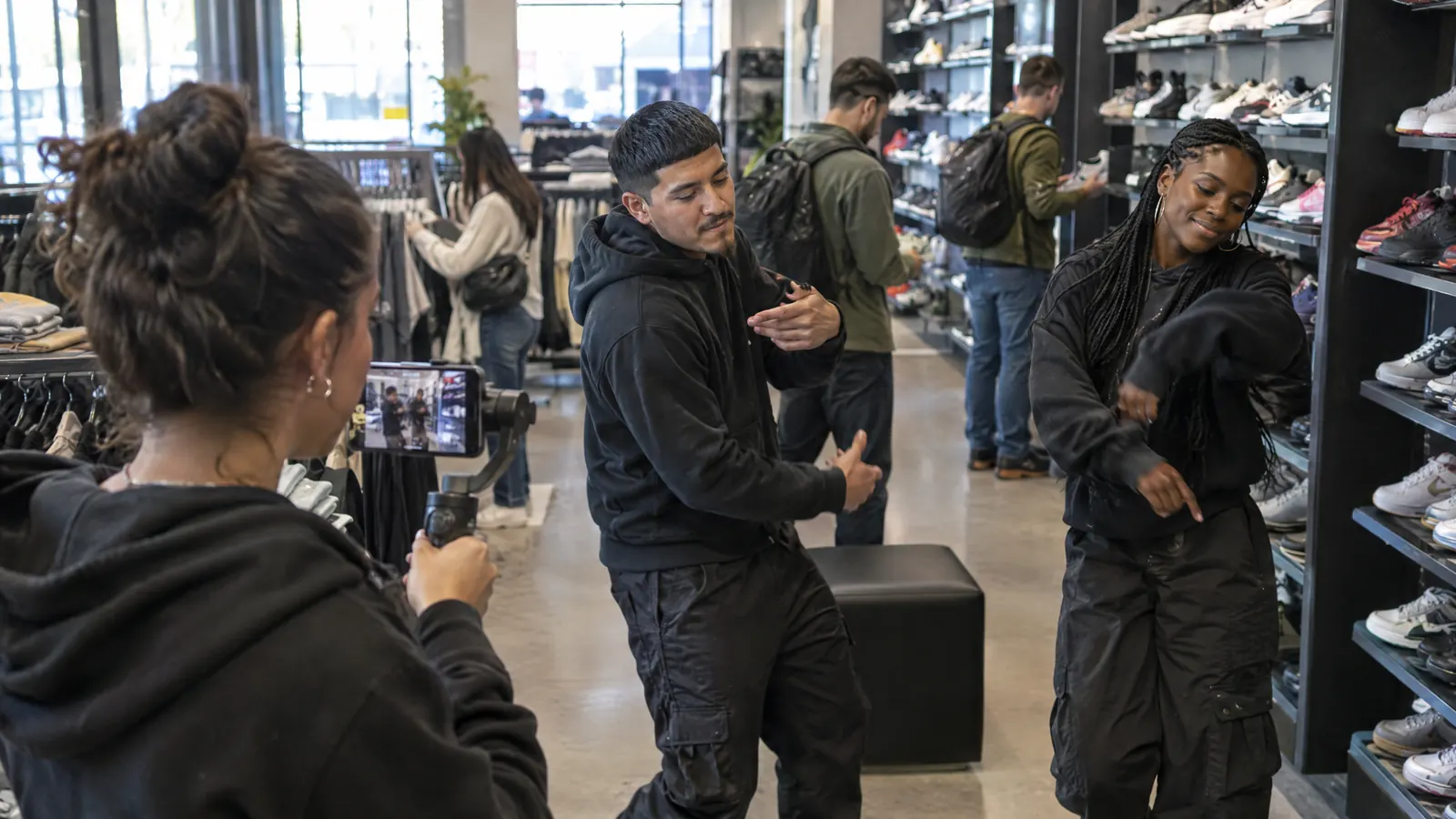 A sneaker store's social team filming a short video